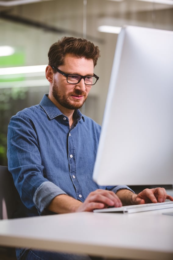 Python development outsourcing team at desk